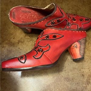 Red leather Shoes. They are Elite by Corkys